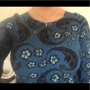 A multi-patterned mini half sleeve dress.